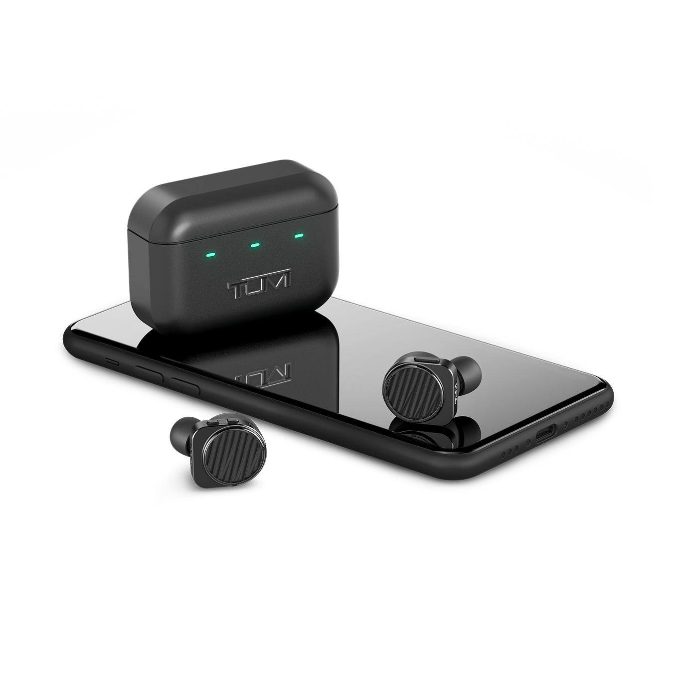 Pair of black TUMI MW09 True Wireless Earphones and black charging case next to a black cell phone for scale | gallery MW09B-TUMI