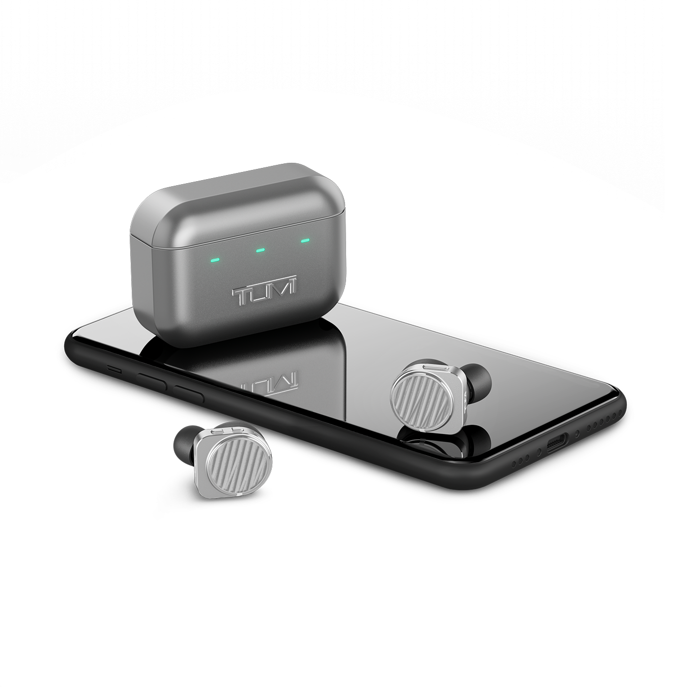 Pair of silver TUMI MW09 True Wireless Earphones and silver charging case next to a black cell phone for scale | gallery MW09S-TUMI